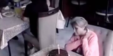 A Woman Was Celebrating Her Birthday By Cutting A Cake Alone, Then Something Happened That Will Make You Emotional