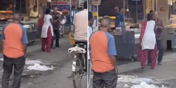 Husband Wife Fighting On The Road Wife Hit The Pot On Husband Head Then What Happened Next Internet Reacts See Viral Video – पति-पत्नी में बीच सड़क पर शुरु हो गई हाथापाई, पत्नी ने पति के सिर पर मारा बर्तन, फिर जो हुआ… लोग बोले