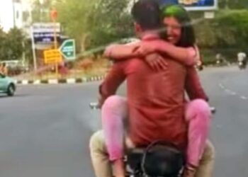Couple Romance On Bike, Bike Par Romance: Jaipur Couple Seen Romancing On Moving Bike After Celebrating Holi