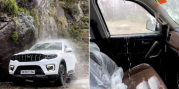 Man Takes His SUV Under A Waterfall And It Starts Leaking, Video Of Mahindra Scorpio-Ns Sunroof Leaking Under Waterfall Goes Viral
