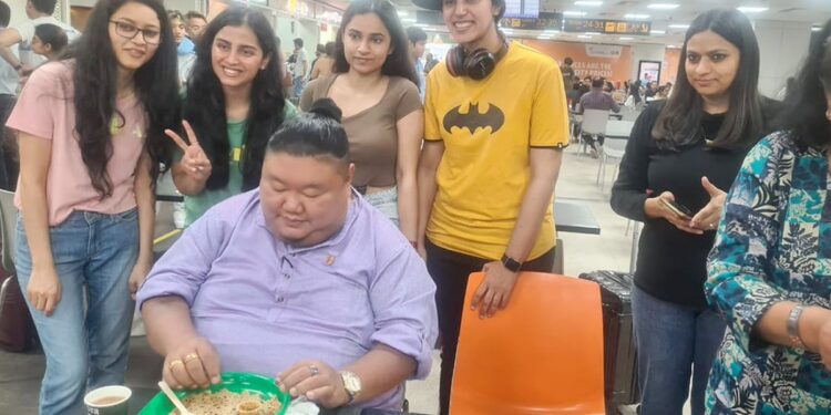 Nagaland Minister Temjen Imna Along Photo With A Group Of Girls Shows His Love For Food